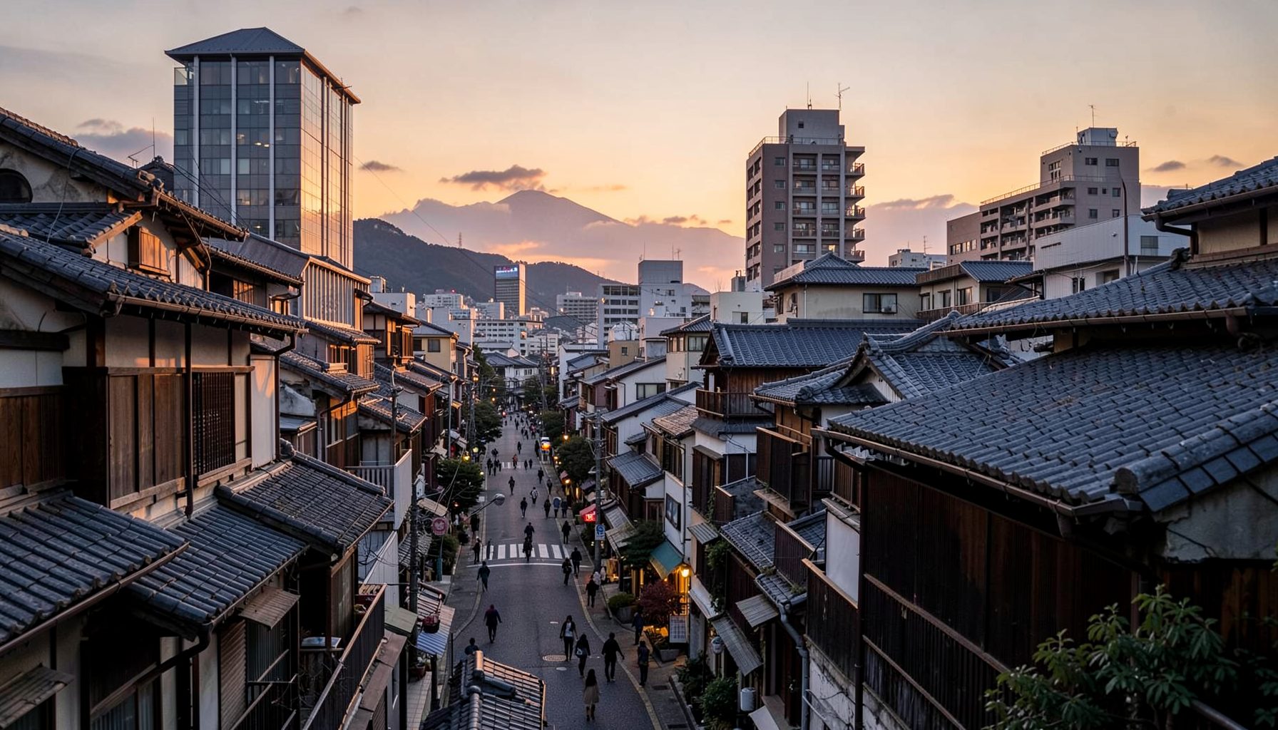 金沢の伝統的な街並みと現代的な都市景観が調和する夕暮れ時の風景、暖かな光に包まれた街